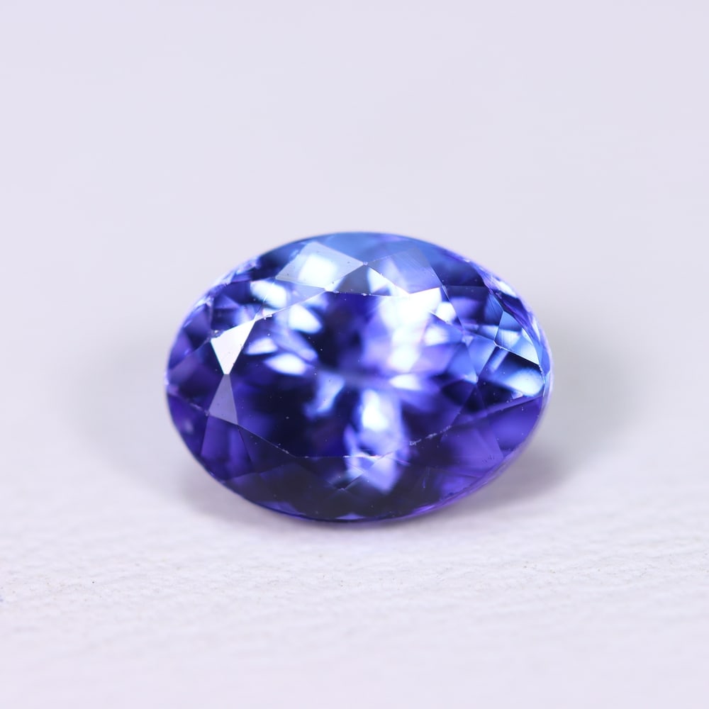 1.77Ct Tanzanite Faceted - Oval Polished , 142B: Ksmith Heritage Auctioneers Subject: Natural Tanzanite Origin: Tanzania Dimension: 8.6x6.5x4.7 mm Treatment: Heated Shape: Oval Type: Faceted, Polished