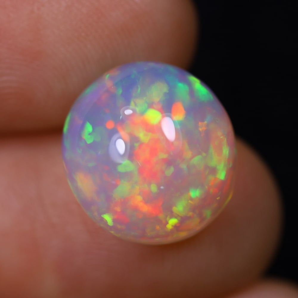 *5.97Ct Welo Opal Polished - Ethiopian Opal, 505B: Ksmith Heritage Auctioneers Subject: Natural Ethiopian Welo Opal Origin: Ethiopia Carat Weight: 5.97Ct Dimension: 13.1x12.3x7.1 mm Treatment: Natural Untreated Type: Cabochon,