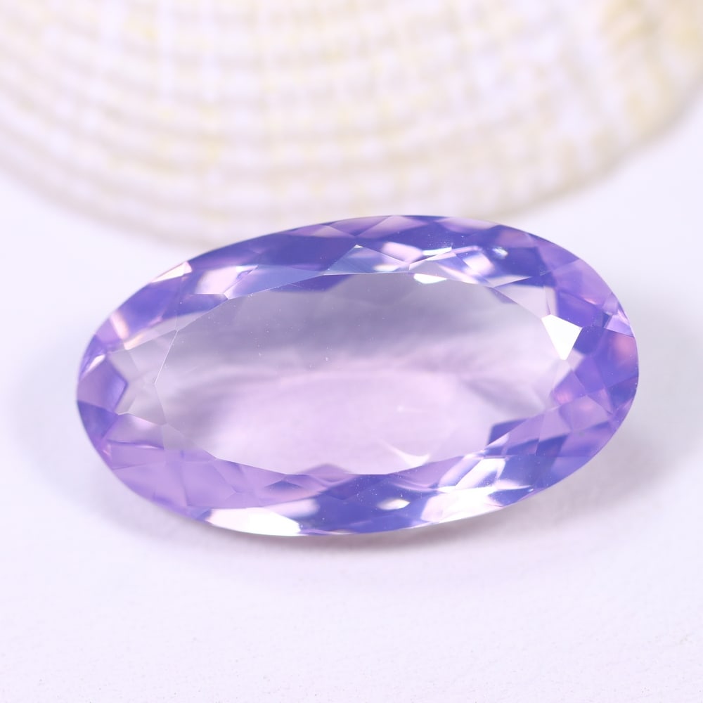 14.09Ct Lavender Amethyst - Polished Faceted , 635E: Ksmith Heritage Auctioneers Subject: Natural Lavender Amethyst Origin: Brazil Carat Weight: 14.09Ct Dimension: 22.9x12.7x7.5 mm Treatment: Untreated Type: Faceted, Polishe