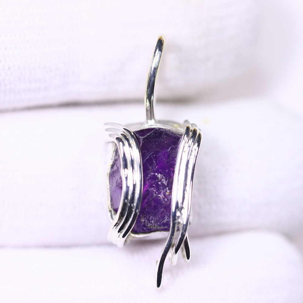 3.46g Crystal Rock Wire Wrap Pendant - 925 Silver , 929E: Ksmith Heritage Auctioneers Subject: Natural Crystal Rock Pendant Type: Pendant