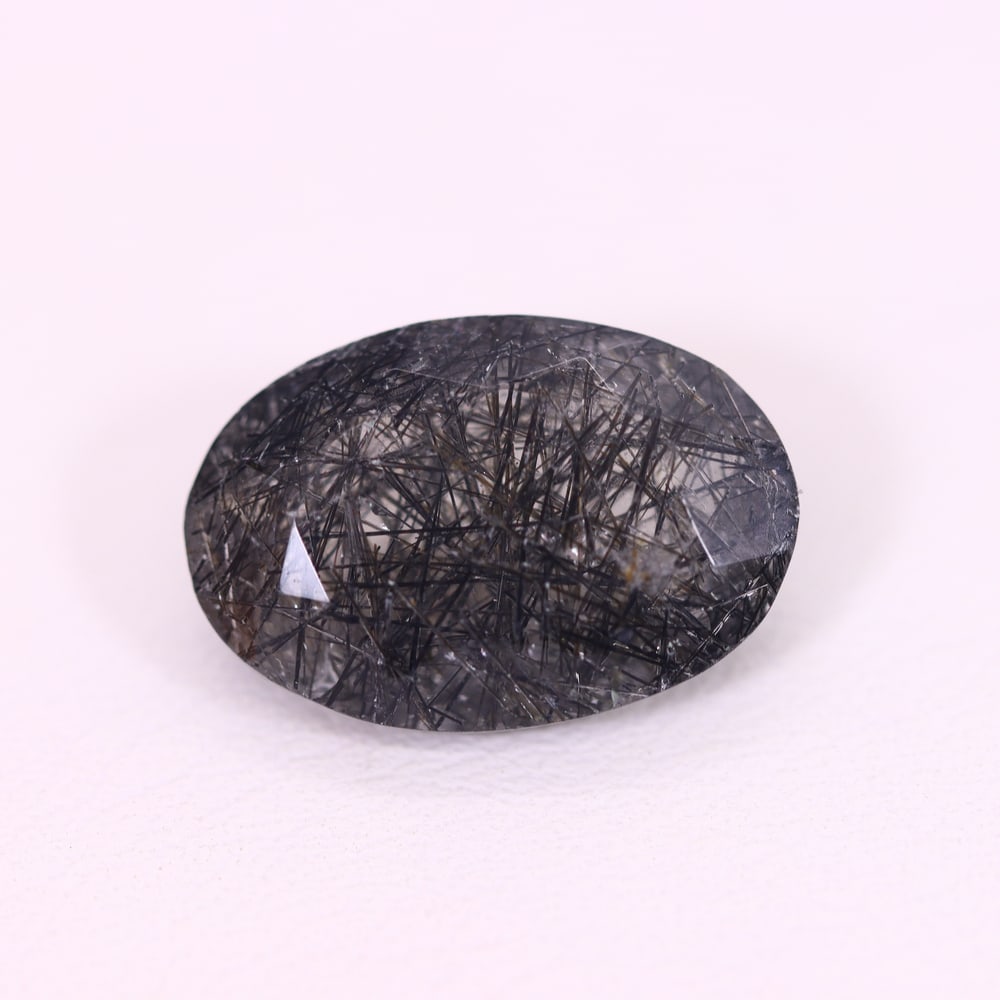 *6.71Ct Black Rutiled Quartz - Polished Faceted , 257C: Ksmith Heritage Auctioneers Subject: Natural Black Rutiled Quartz Carat Weight: 6.71 Ct Dimension: 16.4x11.1x6 mm