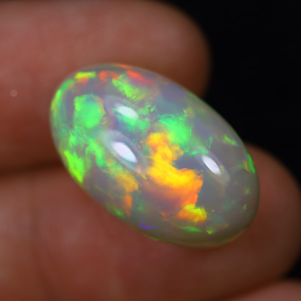 *10.95Ct Welo Opal Polished - Ethiopian Opal, 1105B: Ksmith Heritage Auctioneers Subject: Natural Ethiopian Welo Opal Origin: Ethiopia Carat Weight: 10.95Ct Dimension: 20.3x12.4x9.4 mm Treatment: Natural Untreated Type: Cabochon,