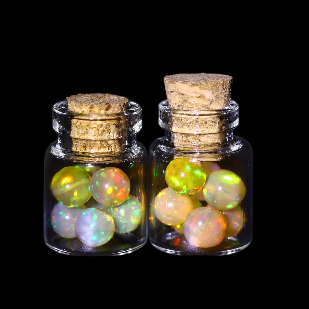 Twin Pack - 4.5mm Ethiopian Opal Ball in Display Jar - Bottle Size 1.5cm , 81C: Ksmith Heritage AuctioneersSubject: Natural Opal (with bottle) Origin: Ethiopia Treatment: Unheated