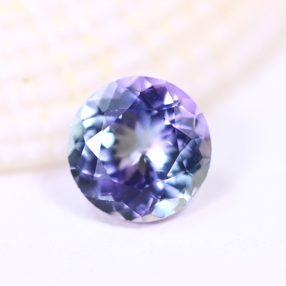 1.70Ct Tanzanite - Polished Faceted - Round Faceted , 313E: Ksmith Heritage Auctioneers Subject: Natural Tanzanite Origin: Tanzania Carat Weight: 1.70Ct Dimension: 7.4 x 7.4 x 4.4 mm Treatment: Heated Shape: Round Type: F