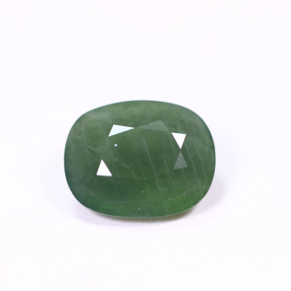 *4.36Ct Heated Green Sapphire - Polished Faceted , 317C: Ksmith Heritage Auctioneers Subject: Natural Sapphire Carat Weight: 4.36Ct Dimension: 10.5x8.3x5.1 mm Treatment: Heated Type: Faceted, Polished