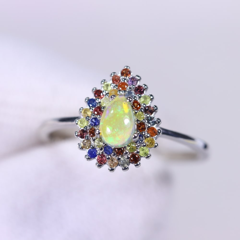 Ring US7.5 Fire Opal & Sapphire - 925 Sterling Silver, 795B: Ksmith Heritage Auctioneers Subject: Natural Fire Opal & Sapphire Diamond Cut Origin: Thailand Carat Weight: 1.82g Dimension: Gemstone 4x6mm Type: Ring