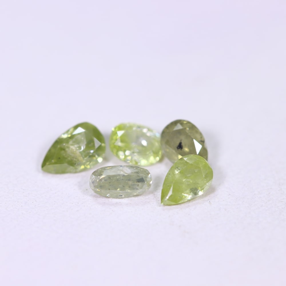 1.01Ct Fancy Diamond Set - Polished Faceted , 690E: Ksmith Heritage Auctioneers Subject: Natural Diamond Origin: Africa Carat Weight: 1.01Ct Dimension: 2.9x3.8x1.8 mm Treatment: Unheated Type: Faceted, Polished