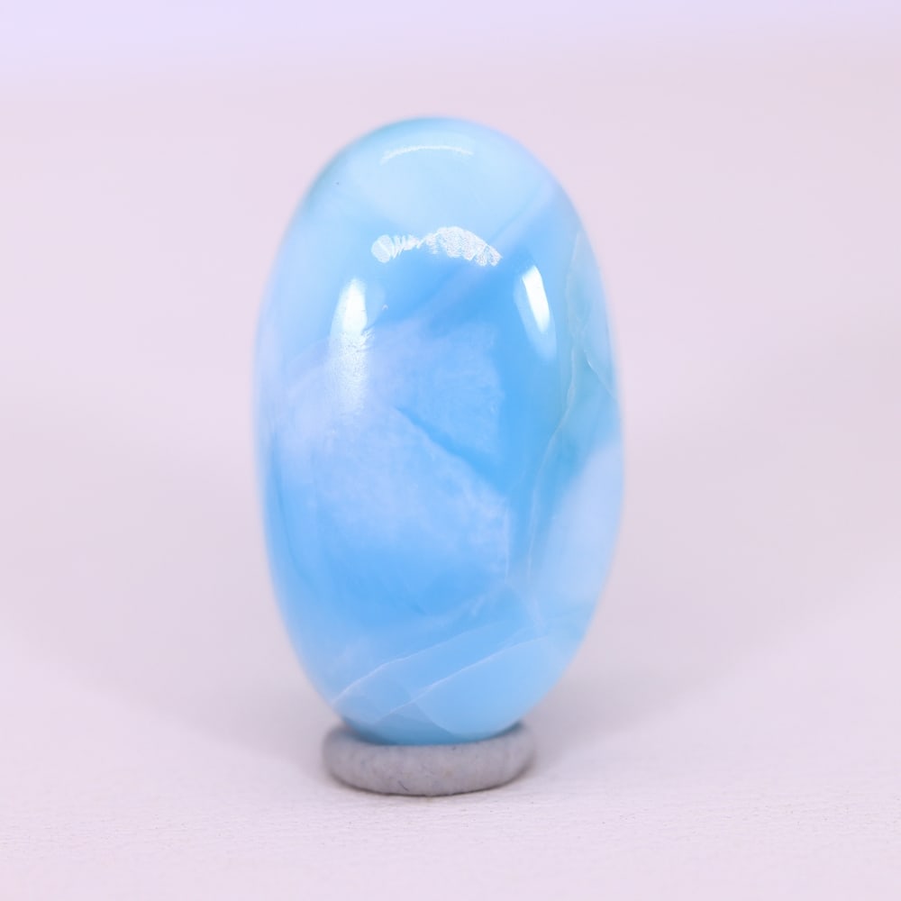 *12.95Ct Natural Larimar - Polished Cabochon , 234C: Ksmith Heritage Auctioneers Subject: Natural Larimar Carat Weight: 12.95 Ct Dimension: 20.2x11.9x5.7 mm Type: Cabochon, Polished