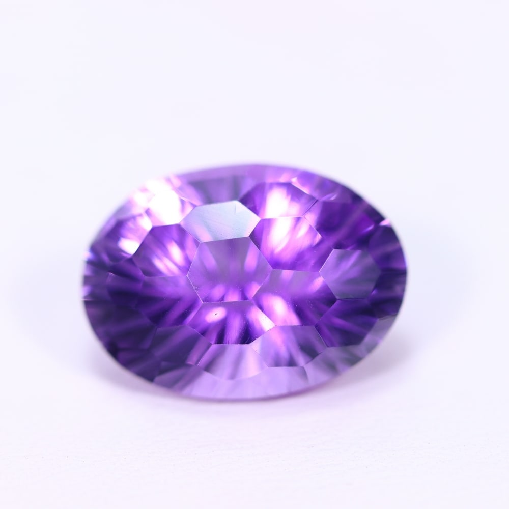 11.22Ct Purple Amethyst - Polished Faceted , 688E: Ksmith Heritage Auctioneers Subject: Natural Amethyst Origin: Brazil Carat Weight: 11.22Ct Dimension: 17.2x12.5x10 mm Treatment: Untreated Type: Faceted, Polished