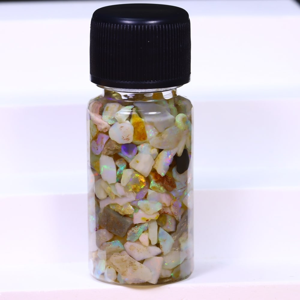 Australian Lightning Ridge Crystal Black Opal Rough Chip Jar (Good For Display), 497B: Ksmith Heritage Auctioneers Subject: Natural Australian Opal Origin: Australia Quantity: 1 Jar as photo