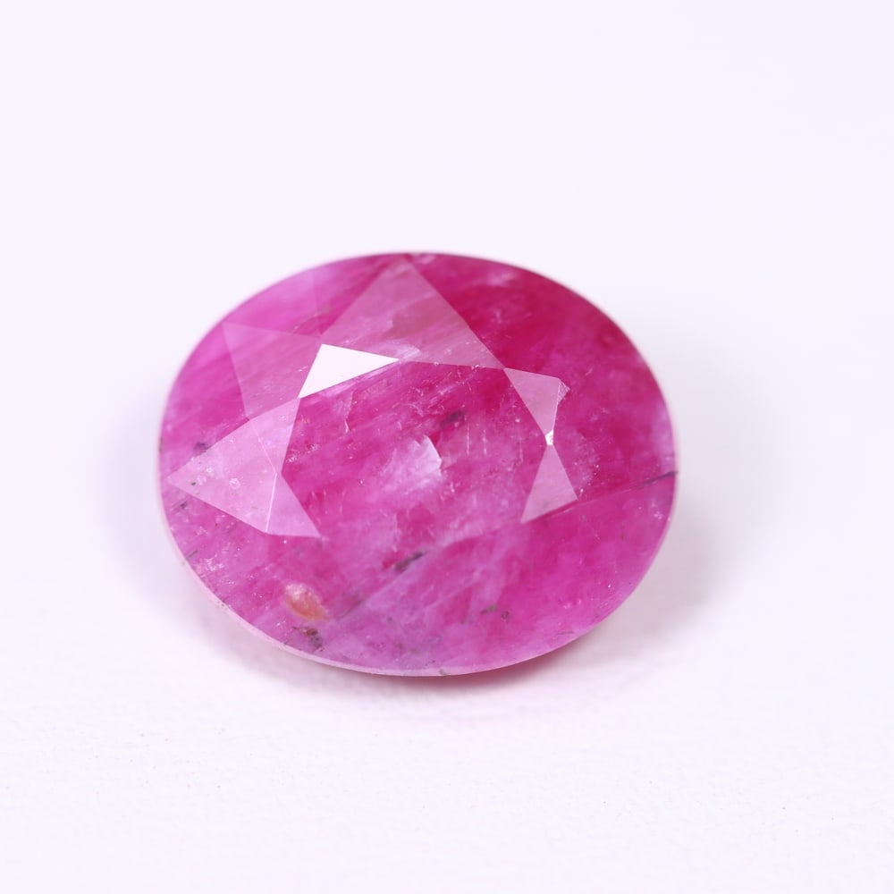 4.88Ct Red Ruby - Polished Faceted , 656E: Ksmith Heritage Auctioneers Subject: Natural Ruby Origin: Burma Carat Weight: 4.88Ct Dimension: 11.5x9.4x5 mm Treatment: Heated Type: Faceted, Polished