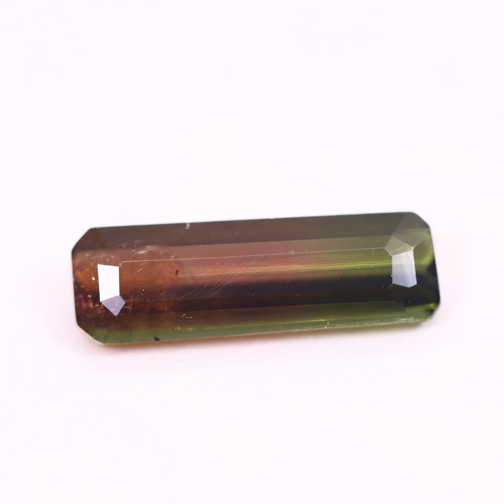 *3.38Ct Natural Watermelon Tourmaline - Bi-Colour Faceted Cut, 151C: Ksmith Heritage Auctioneers Subject: Natural Tourmaline Origin: Africa Carat Weight: 3.38 Ct Dimension: 16.1x5.1x4.1 mm Type: Faceted, Polished