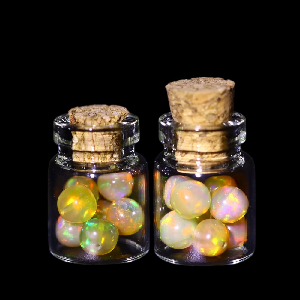 Twin Pack - 4.5mm Ethiopian Opal Ball in Display Jar - Bottle Size 1.5cm , 84C: Ksmith Heritage AuctioneersSubject: Natural Opal (with bottle) Origin: Ethiopia Treatment: Unheated