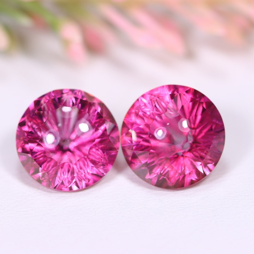 18.30Ct Special Cut Pink Topaz Pair - Polished Faceted , 326E: Ksmith Heritage Auctioneers Subject: Natural Pink Topaz Origin: Myanmar Carat Weight: 18.30Ct Dimension: 12.2x12.2x9.7 mm Treatment: Coated Type: Faceted, Polished