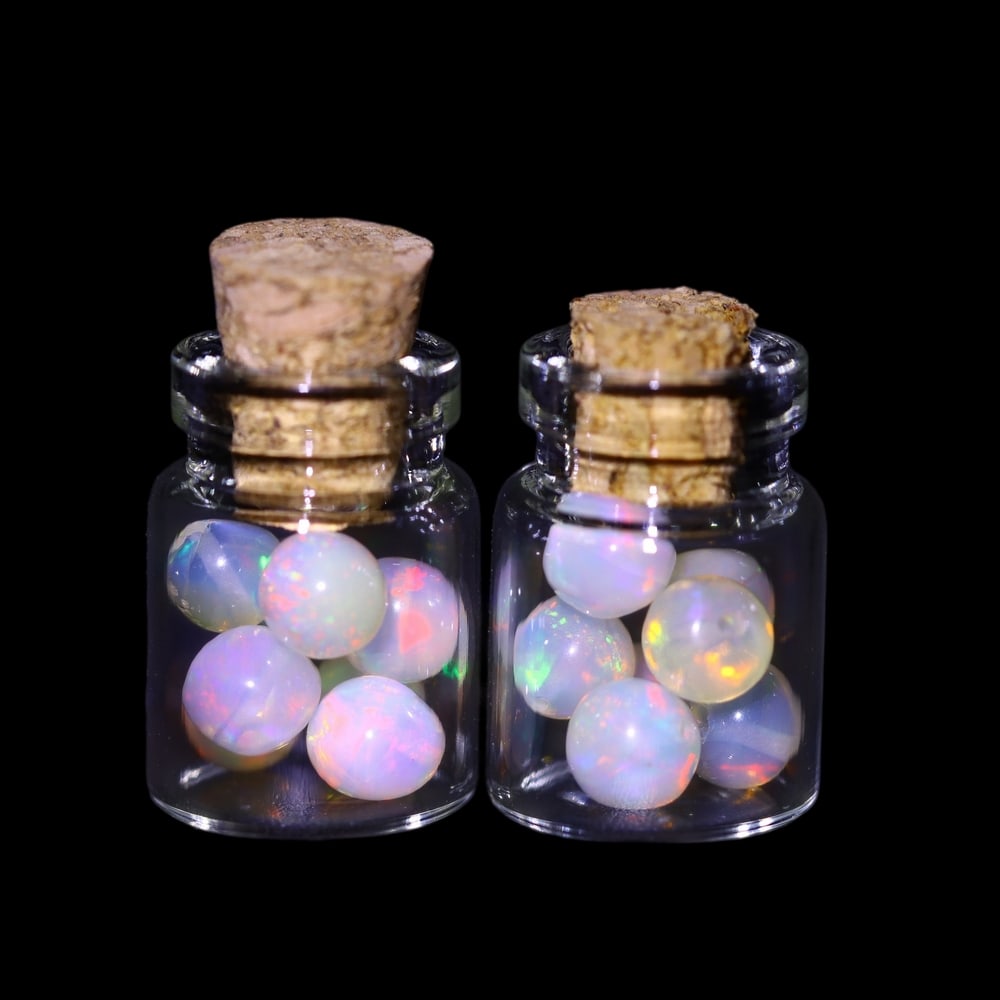 Twin Pack - 4.5mm Ethiopian Opal Ball in Display Jar - Bottle Size 1.5cm , 83C: Ksmith Heritage AuctioneersSubject: Natural Opal (with bottle) Origin: Ethiopia Treatment: Unheated