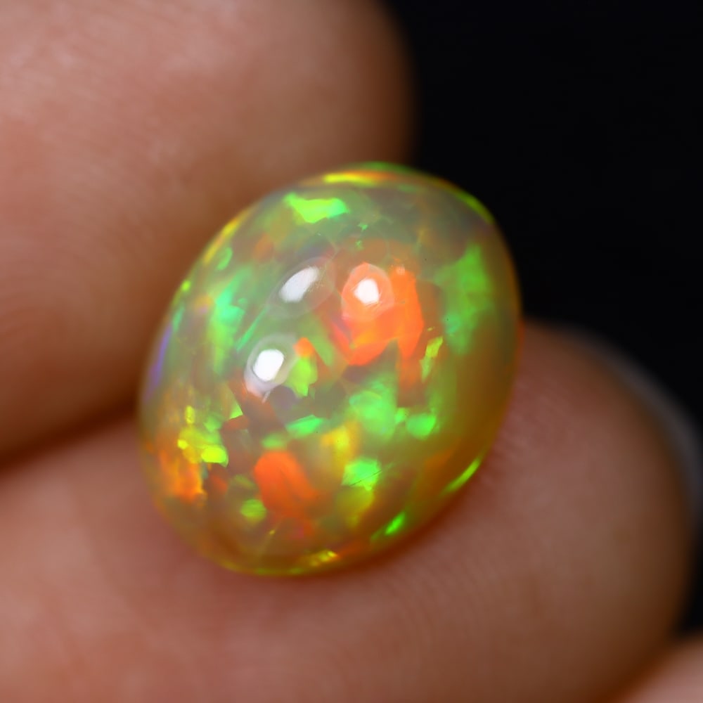 4.35Ct Welo Opal Polished - Ethiopian Opal, 1212B: Ksmith Heritage Auctioneers Subject: Natural Ethiopian Welo Opal Origin: Ethiopia Carat Weight: 4.35Ct Dimension: 12.7x10x7.2 mm Treatment: Natural Untreated Type: Cabochon, Po