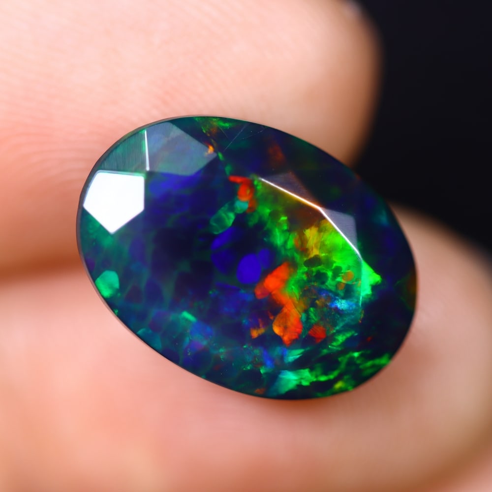 *5.29Ct Smoked Faceted Welo Opal Polished - Ethiopian Opal , 286C: Ksmith Heritage Auctioneers Subject: Natural Ethiopian Welo Opal Origin: Ethiopia Carat Weight: 5.29Ct Dimension: 16.1x11.16x6.6 mm Treatment: Smoked Type: Faceted, Polish