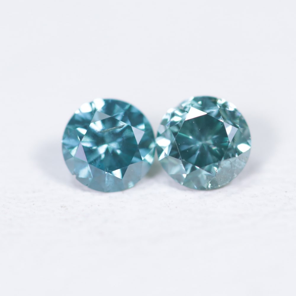 0.39Ct Peacock Diamond Pair - Polished Faceted , 647E: Ksmith Heritage Auctioneers Subject: Natural Diamond Origin: Africa Carat Weight: 0.39Ct Dimension: 3.4 x 3.4 x 2 mm Treatment: HPHT Type: Faceted, Polished