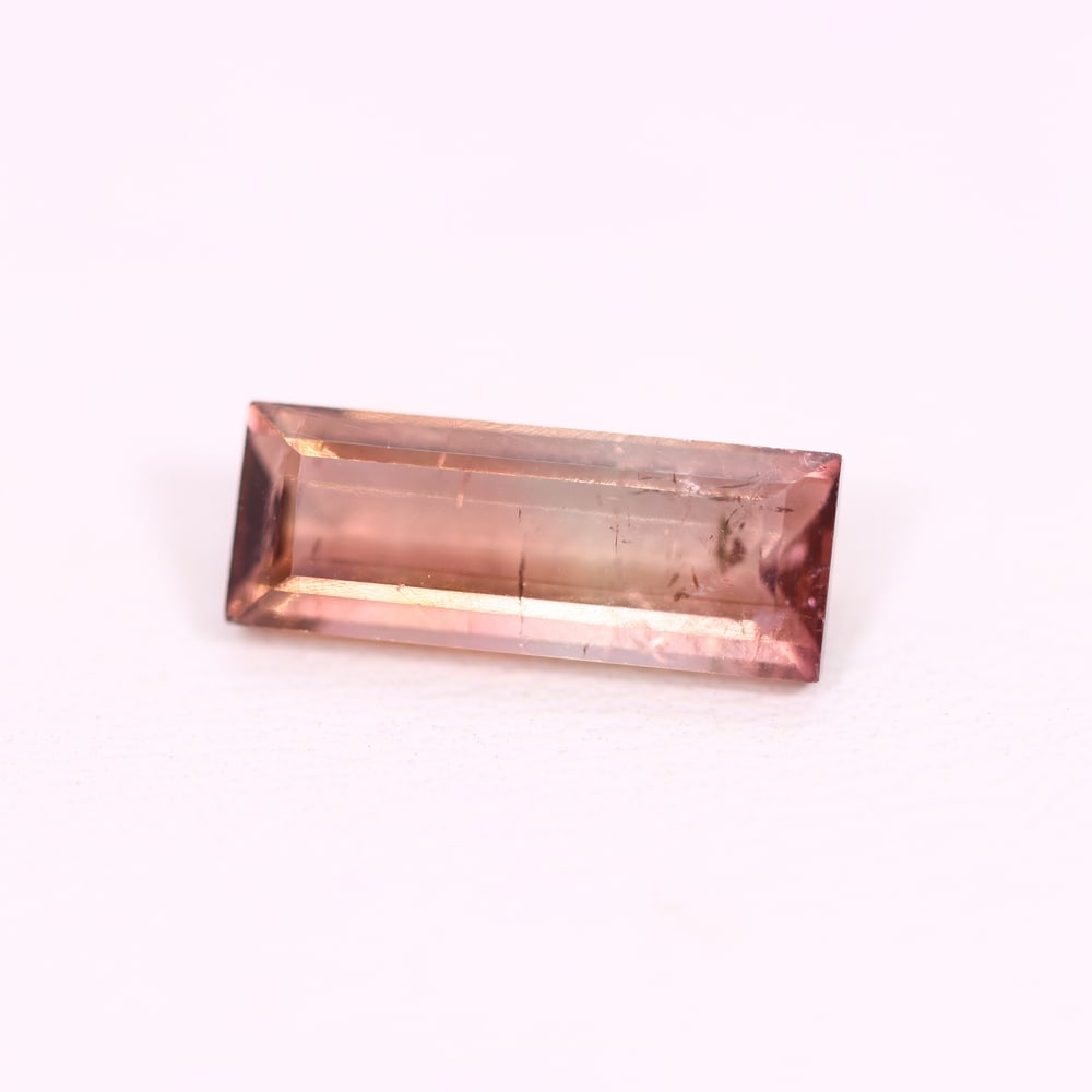*2.14Ct Natural Watermelon Tourmaline - Bi-Colour Faceted Cut, 134C: Ksmith Heritage Auctioneers Subject: Natural Tourmaline Origin: Africa Carat Weight: 2.14 Ct Dimension: 12.4x4.7x3.5 mm Type: Faceted, Polished