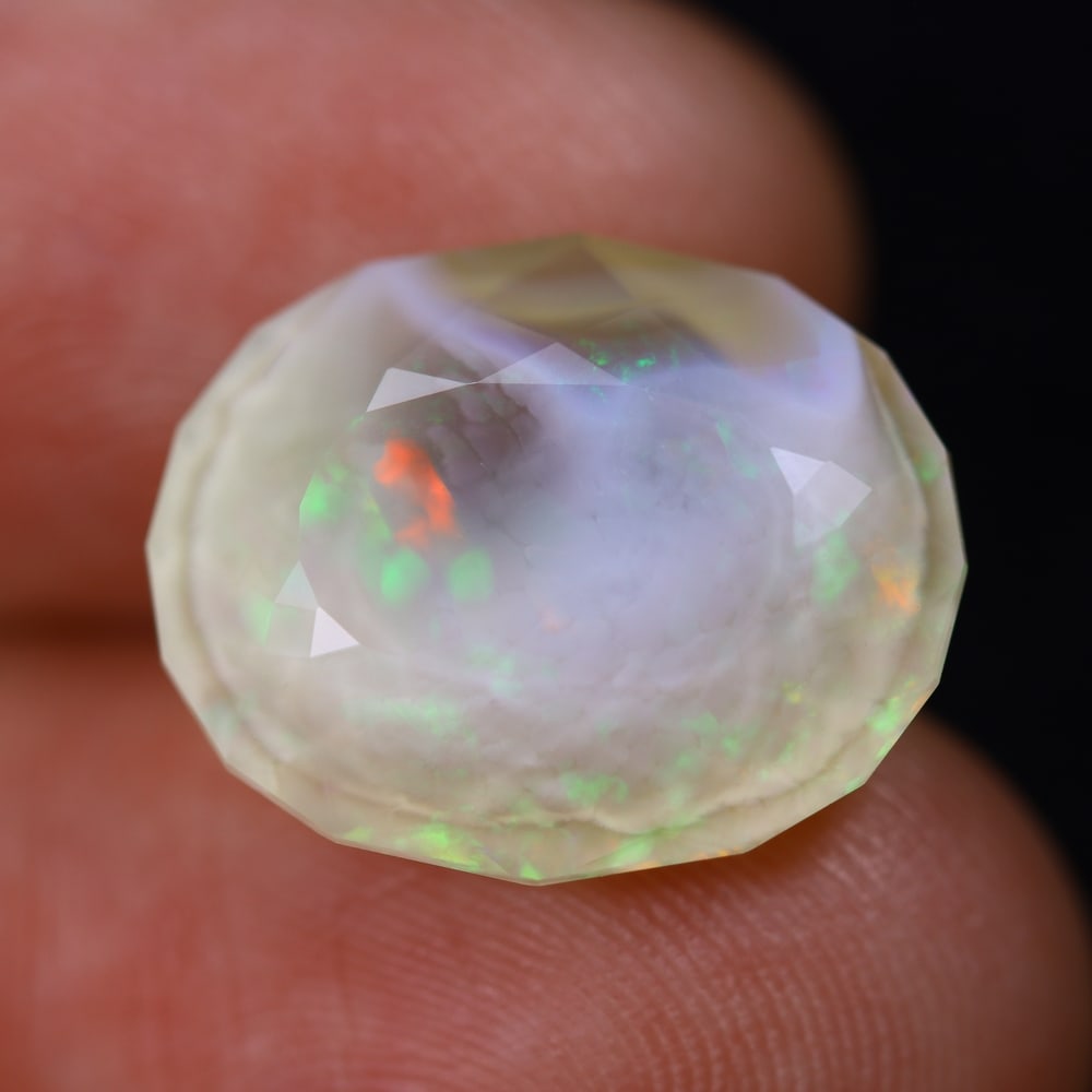 *6.28Ct Faceted Crystal Opal Polished - Ethiopian Opal , 749E: Ksmith Heritage Auctioneers Subject: Natural Ethiopian Crystal Opal Origin: Ethiopia Carat Weight: 6.28Ct Dimension: 16.1x13.1x6.8 mm Treatment: Natural Untreated Type: Fa