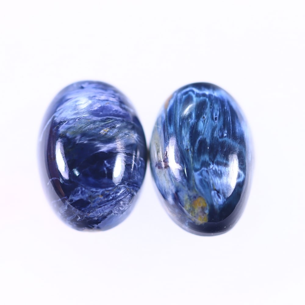 10.38Ct Pietersite Cabochon Pair - Gemstone Crystal - Oval Cabochon, 429B: Ksmith Heritage Auctioneers Subject: Natural Pietersite Origin: Namibia, South Africa Carat Weight: 10.38Ct Dimension: 14 x 10 x 4.8 mm Treatment: Natural Untreated Shape: Oval