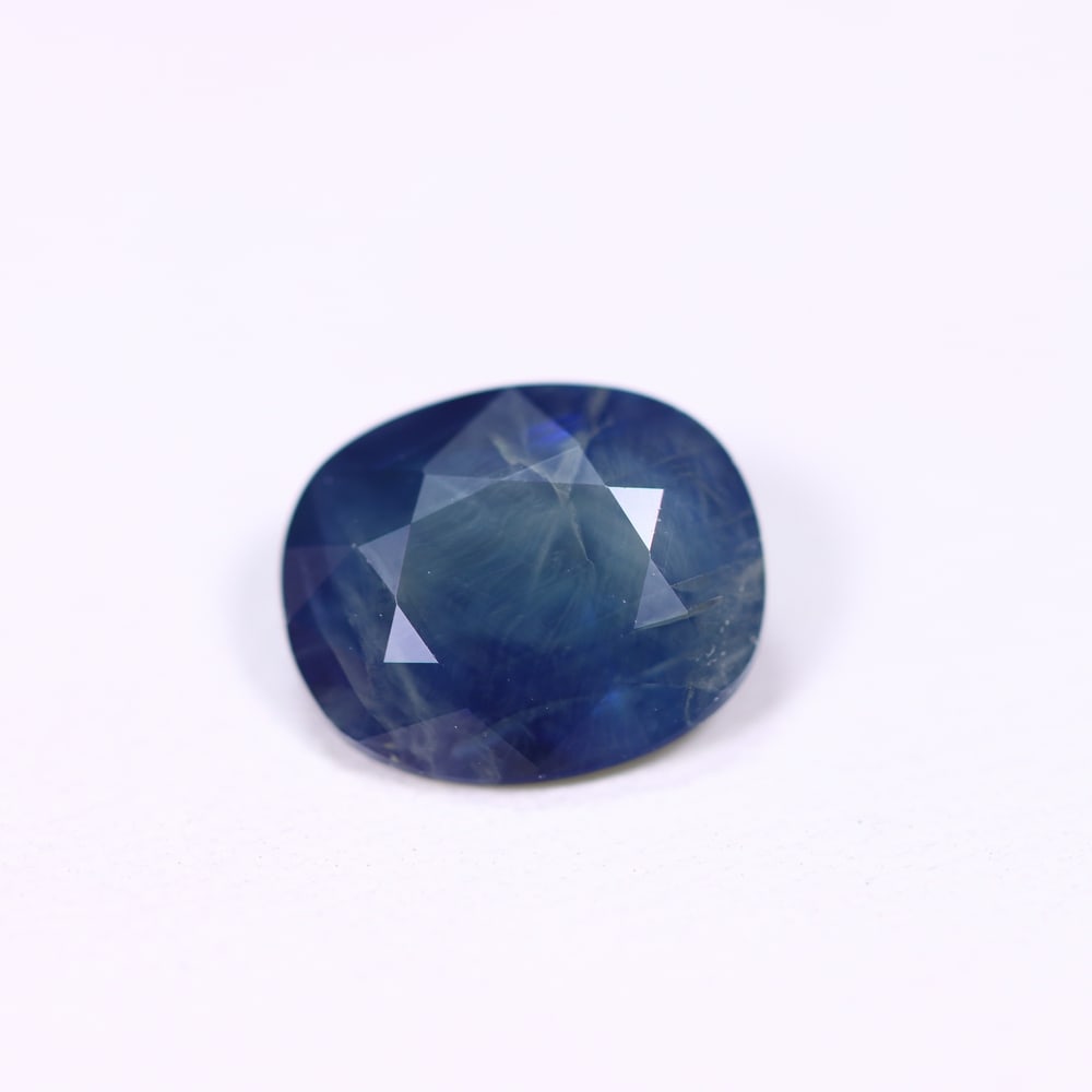 *2.35Ct Heated Blue Sapphire - Polished Faceted , 323C: Ksmith Heritage Auctioneers Subject: Natural Sapphire Carat Weight: 2.35Ct Dimension: 8.8x7.3x3.9 mm Treatment: Heated Type: Faceted, Polished