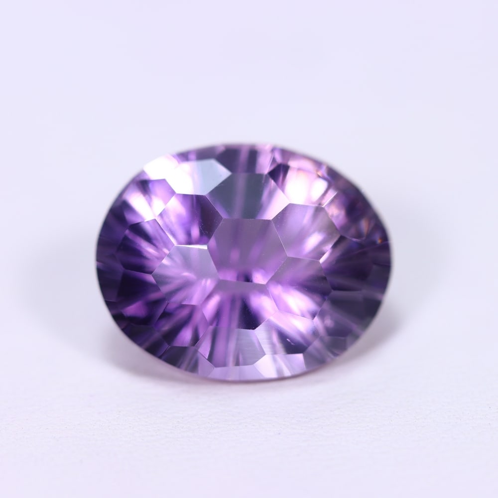 10.46Ct Purple Amethyst - Polished Faceted , 788E: Ksmith Heritage Auctioneers Subject: Natural Amethyst Origin: Brazil Carat Weight: 10.46Ct Dimension: 16.1x13x9.7 mm Treatment: Untreated Type: Faceted, Polished