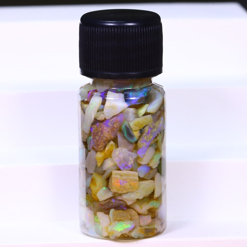 Australian Lightning Ridge Crystal Black Opal Rough Chip Jar (Good For Display), 691B: Ksmith Heritage Auctioneers Subject: Natural Australian Opal Origin: Australia Quantity: 1 Jar as photo