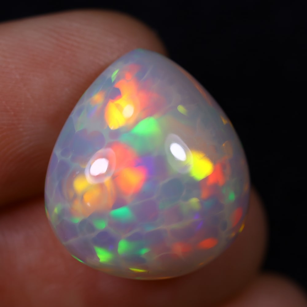 *16.20Ct Welo Opal Polished - Ethiopian Opal , 172E: Ksmith Heritage Auctioneers Subject: Natural Ethiopian Welo Opal Origin: Ethiopia Carat Weight: 16.20Ct Dimension: 18.7x16.9x10.6 mm Treatment: Natural Untreated Type: Ca