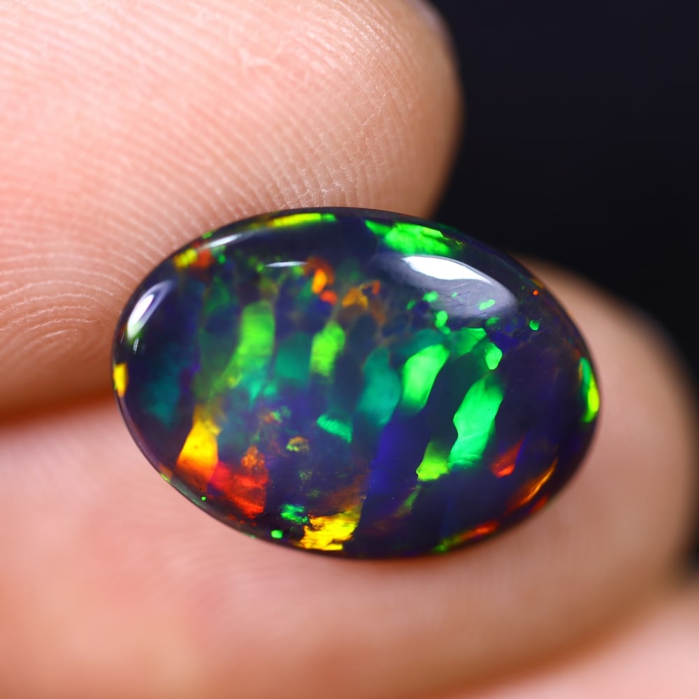 *2.54Ct Smoked Welo Opal Polished - Ethiopian Opal , 316C: Ksmith Heritage Auctioneers Subject: Natural Ethiopian Welo Opal Origin: Ethiopia Carat Weight: 2.54Ct Dimension: 15.7x11.1x3 mm Treatment: Smoked Type: Cabochon, Polished