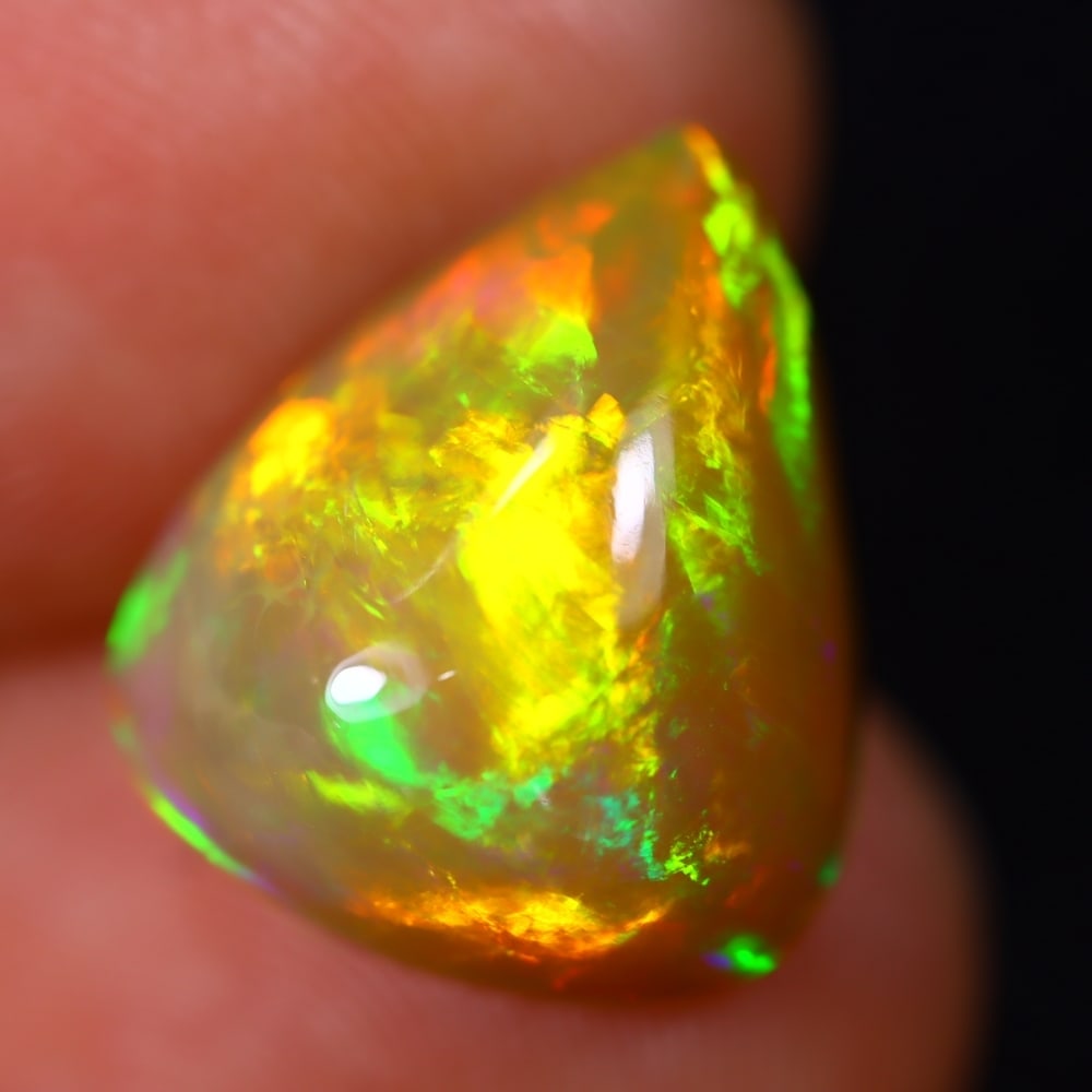 *5.32Ct Welo Opal Polished - Ethiopian Opal - Pear Cabochon, 626B: Ksmith Heritage Auctioneers Subject: Natural Ethiopian Welo Opal Origin: Ethiopia Carat Weight: 5.32Ct Dimension: 14.5 x 12.4 x 6.9 mm Treatment: Natural Untreated Shape: Pear