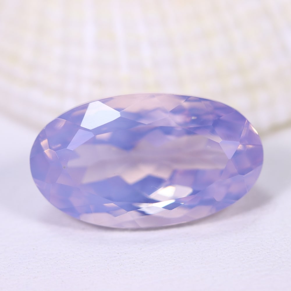 9.14Ct Lavender Amethyst - Polished Faceted , 310E: Ksmith Heritage Auctioneers Subject: Natural Lavender Amethyst Origin: Brazil Carat Weight: 9.14Ct Dimension: 17.7x10.2x8.5 mm Treatment: Untreated Type: Faceted, Polished