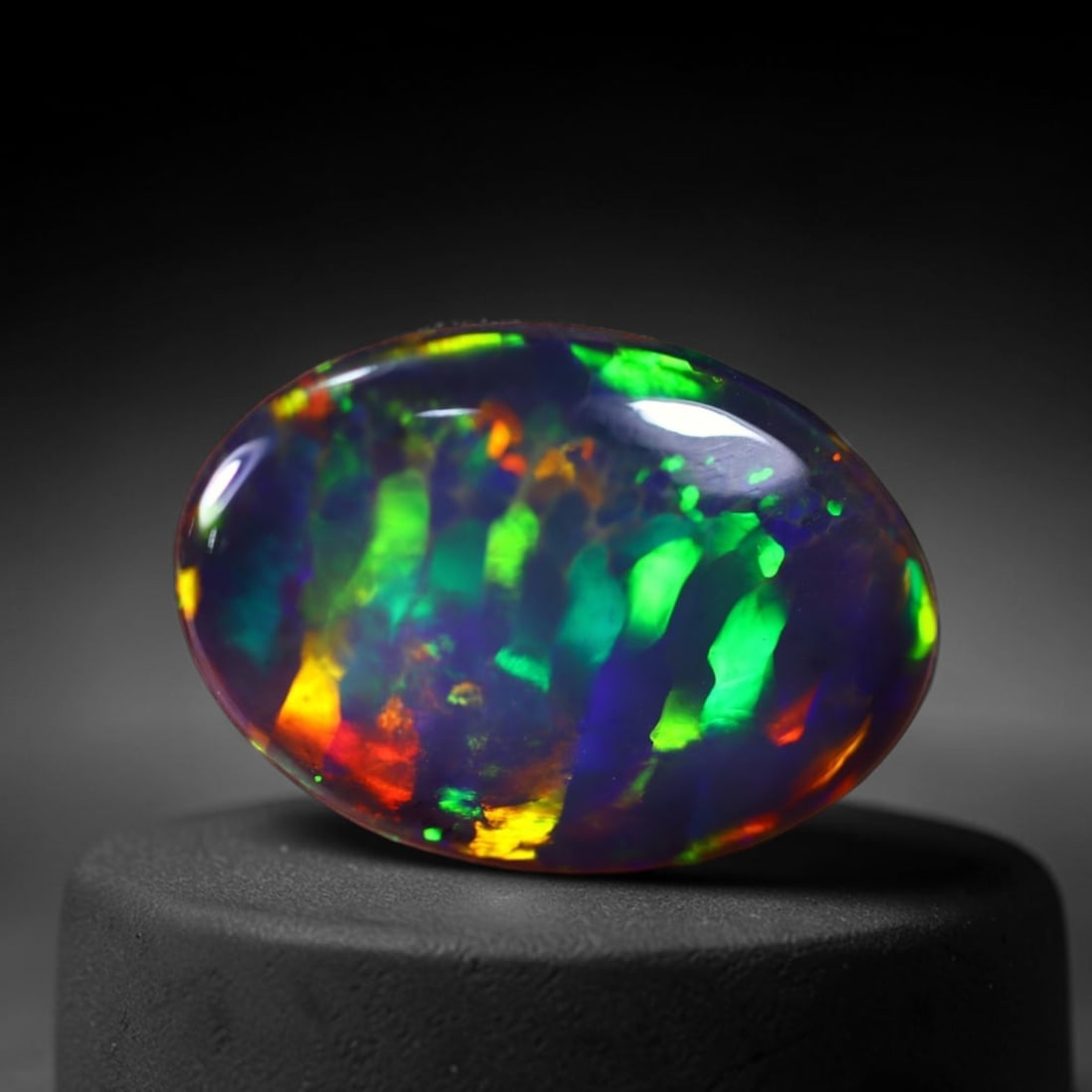 *2.54Ct Smoked Welo Opal Polished - Ethiopian Opal , 316C: Ksmith Heritage Auctioneers Subject: Natural Ethiopian Welo Opal Origin: Ethiopia Carat Weight: 2.54Ct Dimension: 15.7x11.1x3 mm Treatment: Smoked Type: Cabochon, Polished