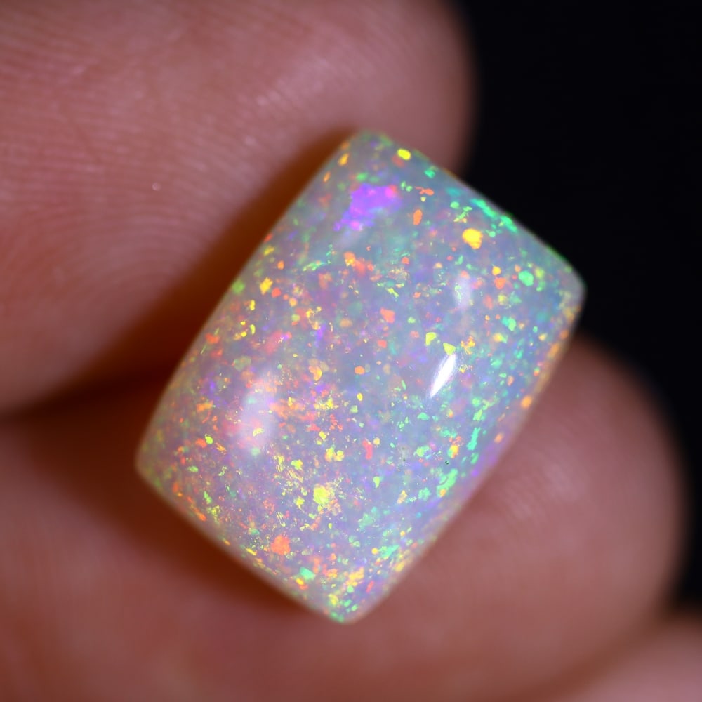 *6.17Ct Welo Opal Polished - Ethiopian Opal , 392C: Ksmith Heritage Auctioneers Subject: Natural Ethiopian Welo Opal Origin: Ethiopia Carat Weight: 6.17Ct Dimension: 14.3x10.2x6.9 mm Treatment: Natural Untreated Type: Caboc