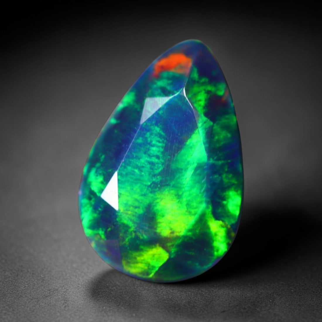 *3.18Ct Welo Black Opal - Ethiopian Opal - Faceted Polished , 948E: Ksmith Heritage Auctioneers Subject: Natural Ethiopian Welo Black Opal Origin: Ethiopia Carat Weight: 3.18Ct Dimension: 13.9x9.3x6.3 mm Treatment: Smoked Type: Faceted, Po