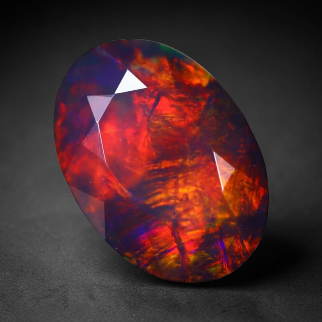 *4.93Ct Smoked Faceted Welo Opal Polished - Ethiopian Opal , 277C: Ksmith Heritage Auctioneers Subject: Natural Ethiopian Welo Opal Origin: Ethiopia Carat Weight: 4.93Ct Dimension: 16.2x11.5x6.1 mm Treatment: Smoked Type: Faceted, Polishe