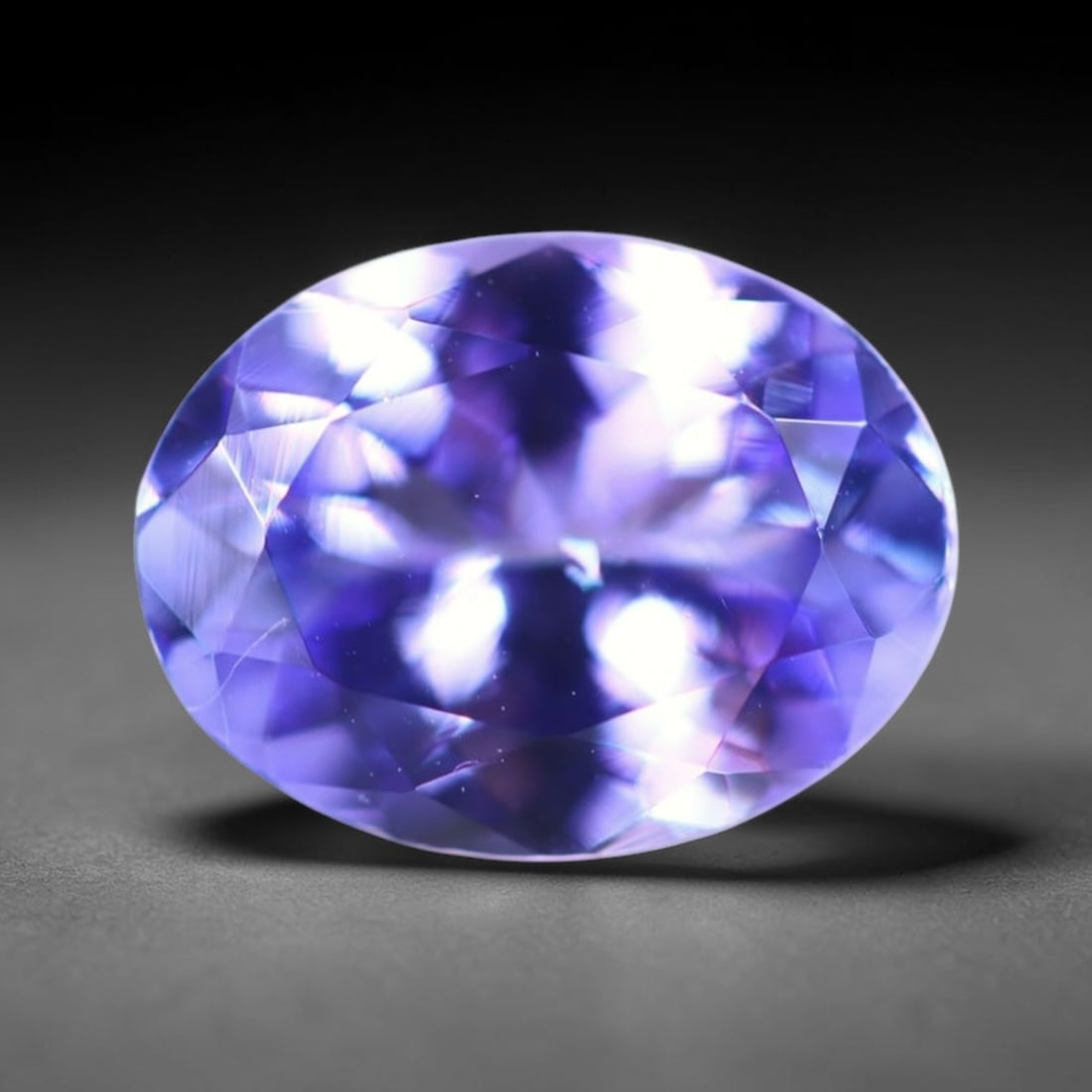 1.67Ct Tanzanite - Polished Faceted - Oval Faceted , 8E: Ksmith Heritage Auctioneers Subject: Natural Tanzanite Origin: Tanzania Carat Weight: 1.67Ct Dimension: 8.8 x 6.7 x 3.9 mm Treatment: Heated Shape: Oval Type: Fa