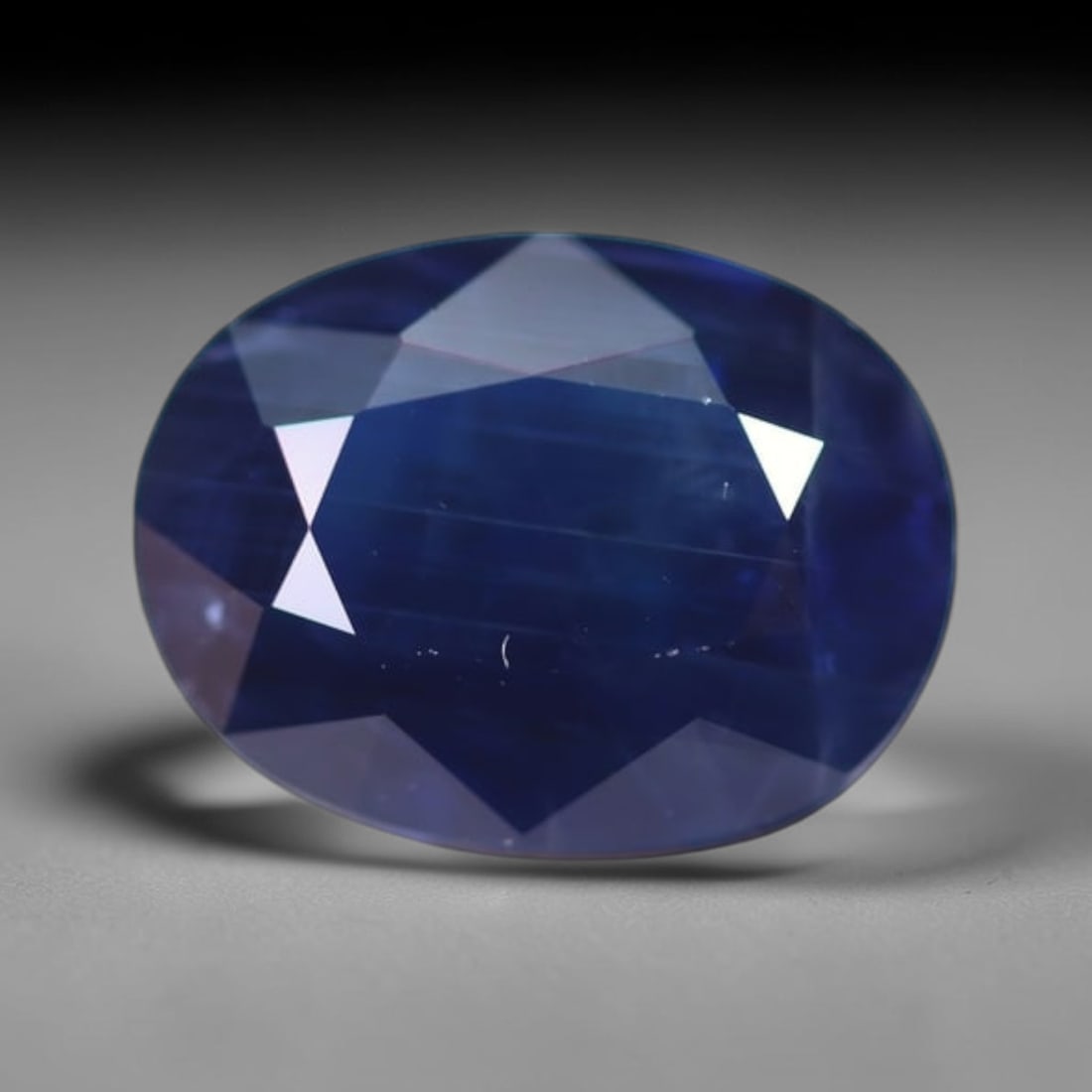 *1.90Ct Heated Blue Sapphire - Polished Faceted , 324C: Ksmith Heritage Auctioneers Subject: Natural Sapphire Carat Weight: 1.90Ct Dimension: 8.6x6.5x3.6 mm Treatment: Heated Type: Faceted, Polished