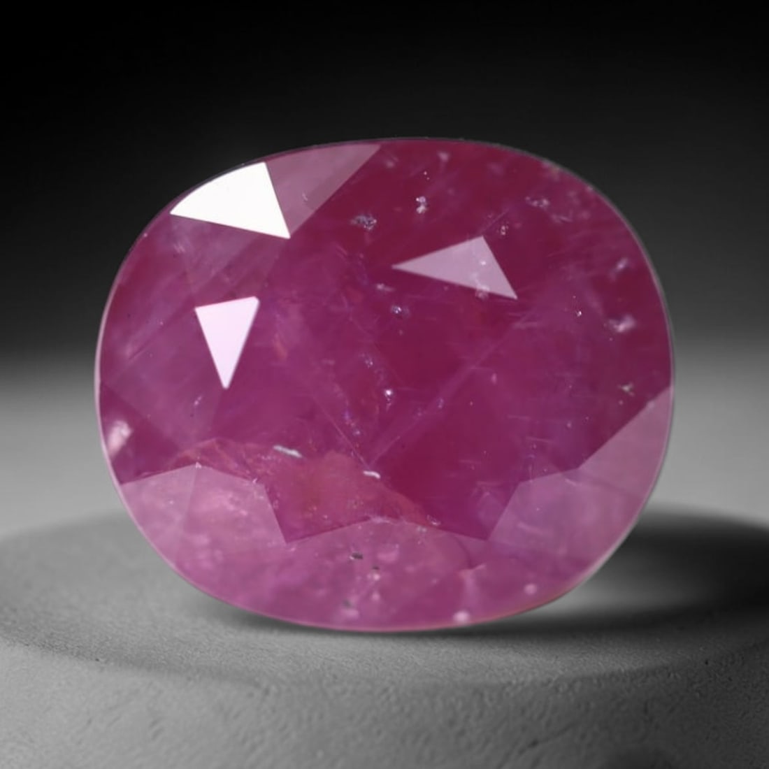 *4.42Ct Heated Pink Sapphire - Polished Faceted , 318C: Ksmith Heritage Auctioneers Subject: Natural Sapphire Carat Weight: 4.42Ct Dimension: 9.6x8x6.3 mm Treatment: Heated Type: Faceted, Polished