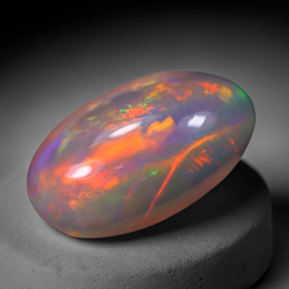 *7.03Ct Welo Opal Polished - Ethiopian Opal, 545B: Ksmith Heritage Auctioneers Subject: Natural Ethiopian Welo Opal Origin: Ethiopia Carat Weight: 7.03Ct Dimension: 18.6x10.9x6.9 mm Treatment: Natural Untreated Type: Cabochon,