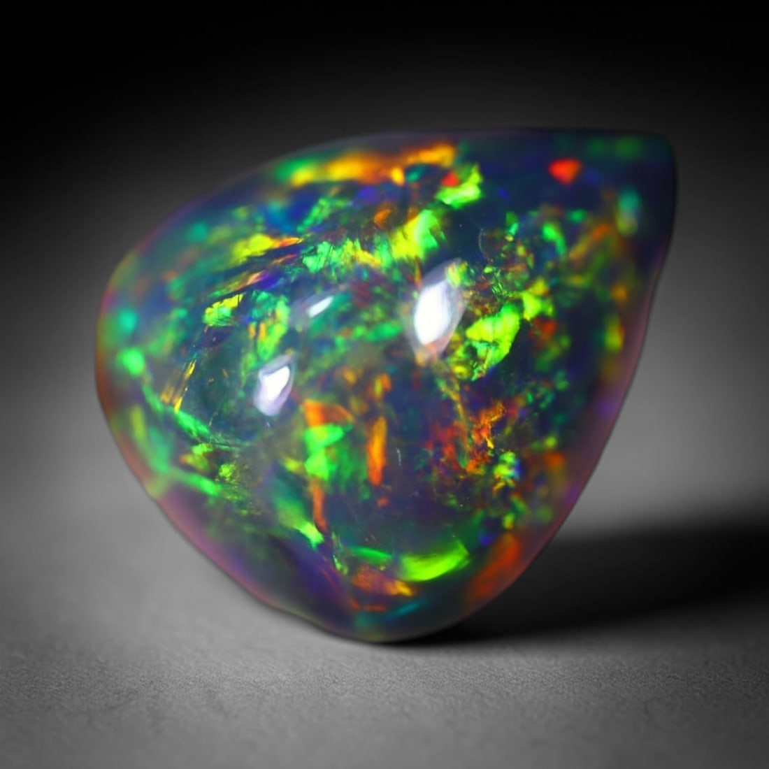 *4.01ct Welo Black Opal Polished - Ethiopian Opal, 631B: Ksmith Heritage Auctioneers Subject: Natural Ethiopian Welo Black Opal Origin: Ethiopia Carat Weight: 4.01Ct Dimension: 12.6x10.6x7.4 mm Treatment: Smoked Type: Cabochon, Polis
