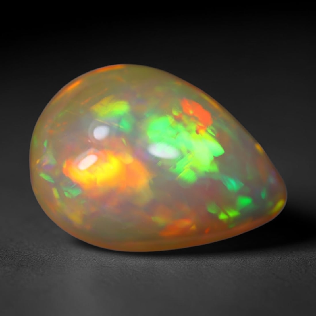 *4.69Ct Welo Opal Polished - Ethiopian Opal, 518B: Ksmith Heritage Auctioneers Subject: Natural Ethiopian Welo Opal Origin: Ethiopia Carat Weight: 4.69Ct Dimension: 14.9x10.5x6.3 mm Treatment: Natural Untreated Type: Cabochon,