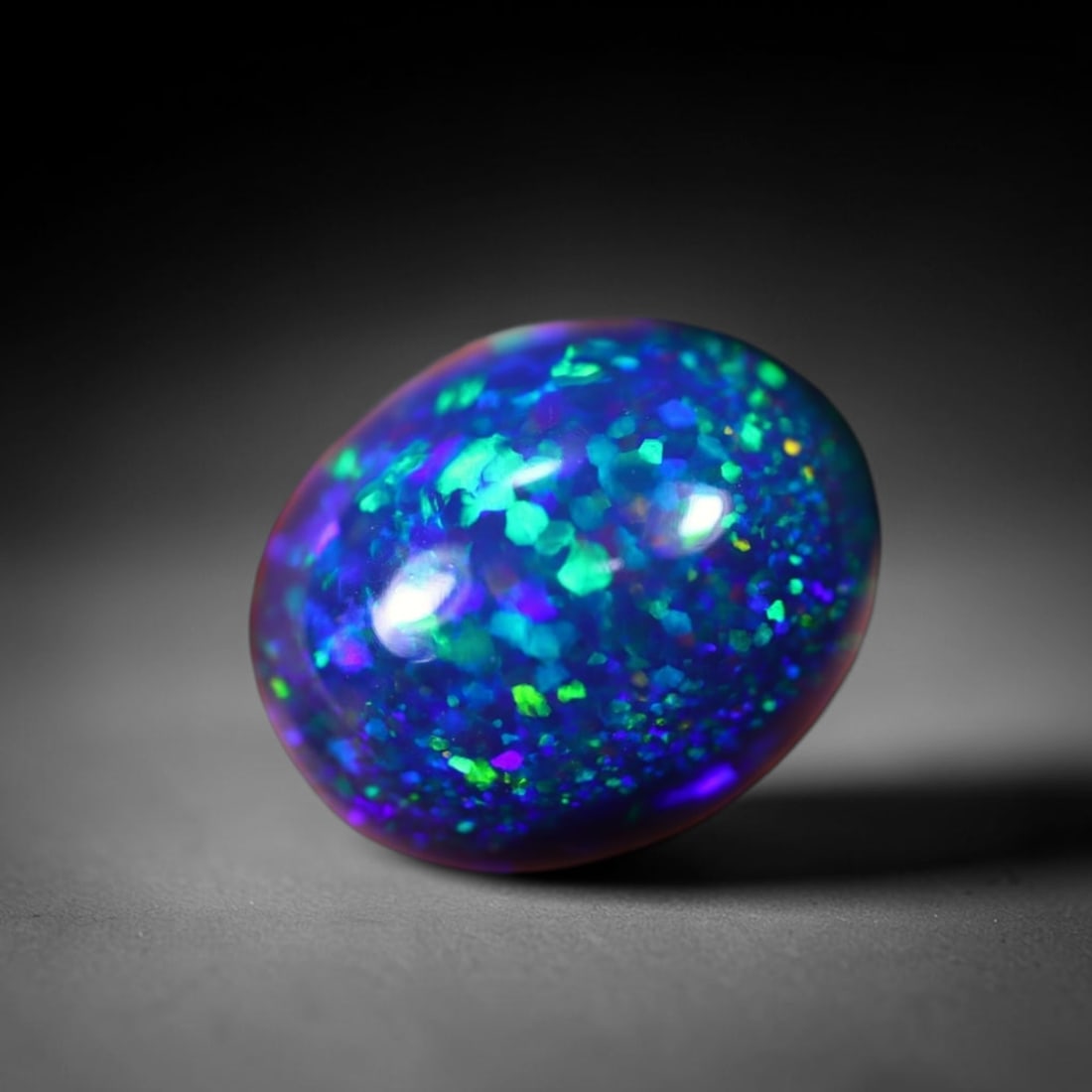 *2.93Ct Smoked Welo Opal Polished - Ethiopian Opal , 312C: Ksmith Heritage Auctioneers Subject: Natural Ethiopian Welo Opal Origin: Ethiopia Carat Weight: 2.93Ct Dimension: 11.1x9.1x5.6 mm Treatment: Smoked Type: Cabochon, Polishe