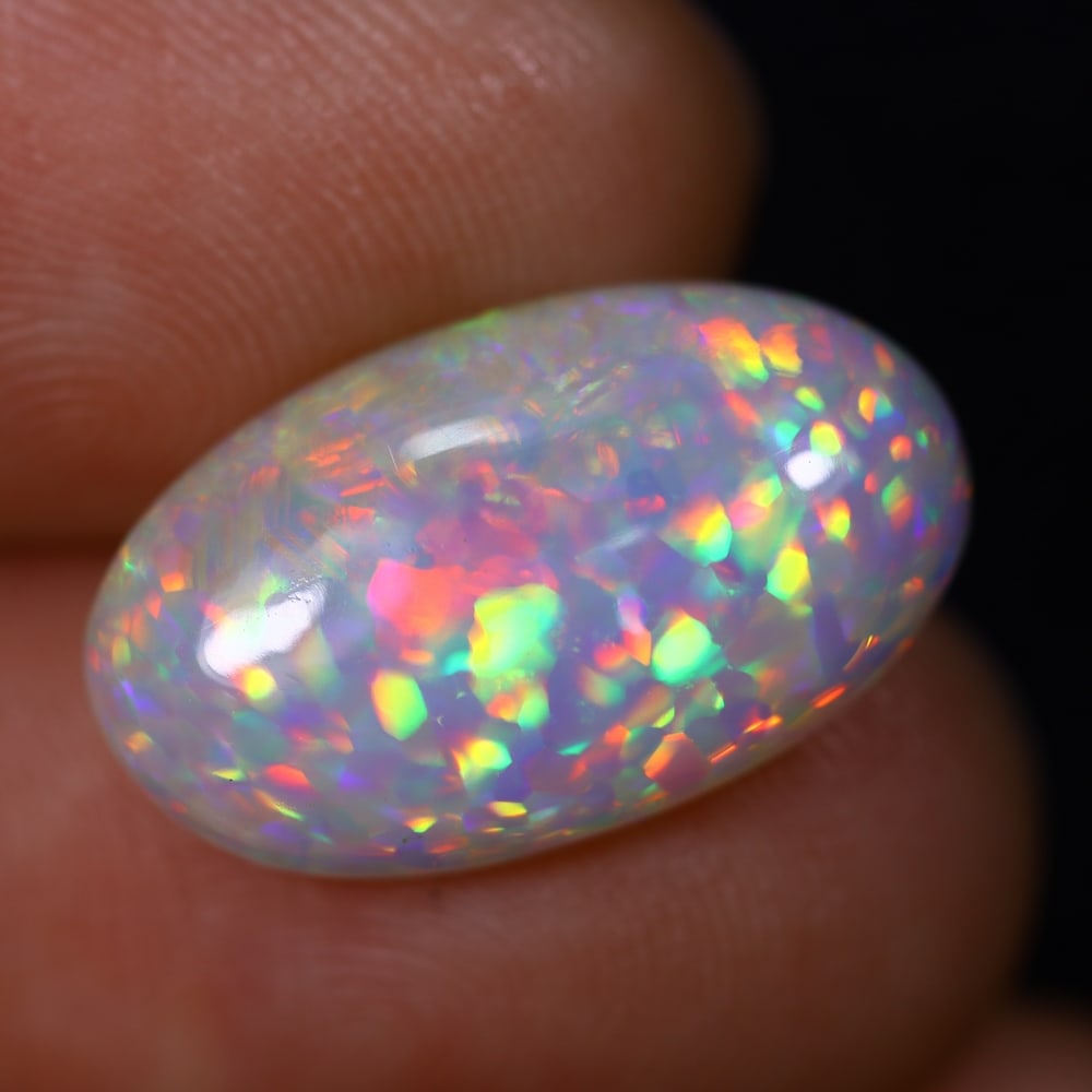 *5.31Ct Welo Opal Polished - Ethiopian Opal , 410C: Ksmith Heritage Auctioneers Subject: Natural Ethiopian Welo Opal Origin: Ethiopia Carat Weight: 5.31Ct Dimension: 18x10.6x5.4 mm Treatment: Natural Untreated Type: Cabocho