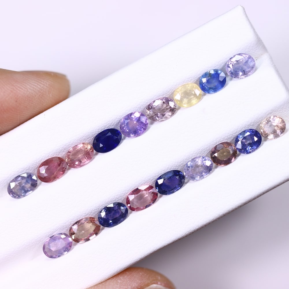 *9.75Ct Heated Fancy Sapphire Lot - Polished Faceted , 353C: Ksmith Heritage Auctioneers Subject: Natural Sapphire Carat Weight: 9.75Ct Dimension: 5.8x4x2.5 mm Treatment: Heated Type: Faceted, Polished