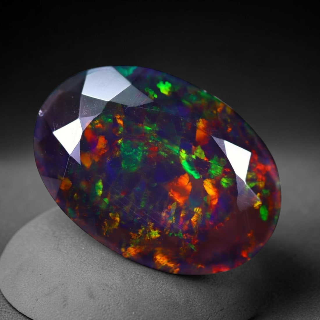 *10.52Ct Smoked Faceted Welo Opal Polished - Ethiopian Opal , 270C: Ksmith Heritage Auctioneers Subject: Natural Ethiopian Welo Opal Origin: Ethiopia Carat Weight: 10.52Ct Dimension: 22.6x15.8x6.6 mm Treatment: Smoked Type: Faceted, Polish