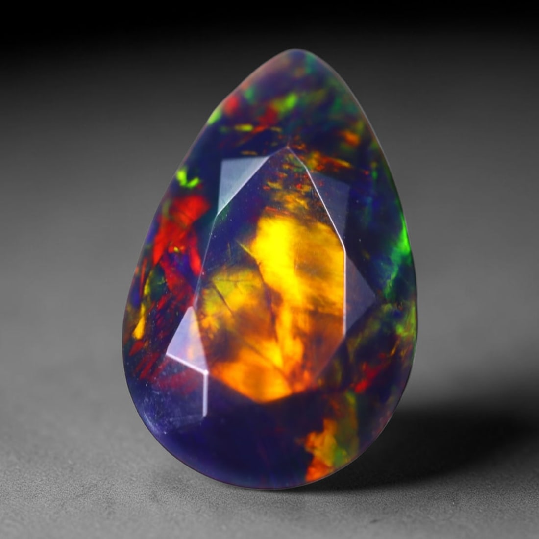 *2.65Ct Welo Black Opal - Ethiopian Opal - Faceted Polished , 456E: Ksmith Heritage Auctioneers Subject: Natural Ethiopian Welo Black Opal Origin: Ethiopia Carat Weight: 2.65Ct Dimension: 14.8x9.6x5.4 mm Treatment: Smoked Type: Faceted, Po