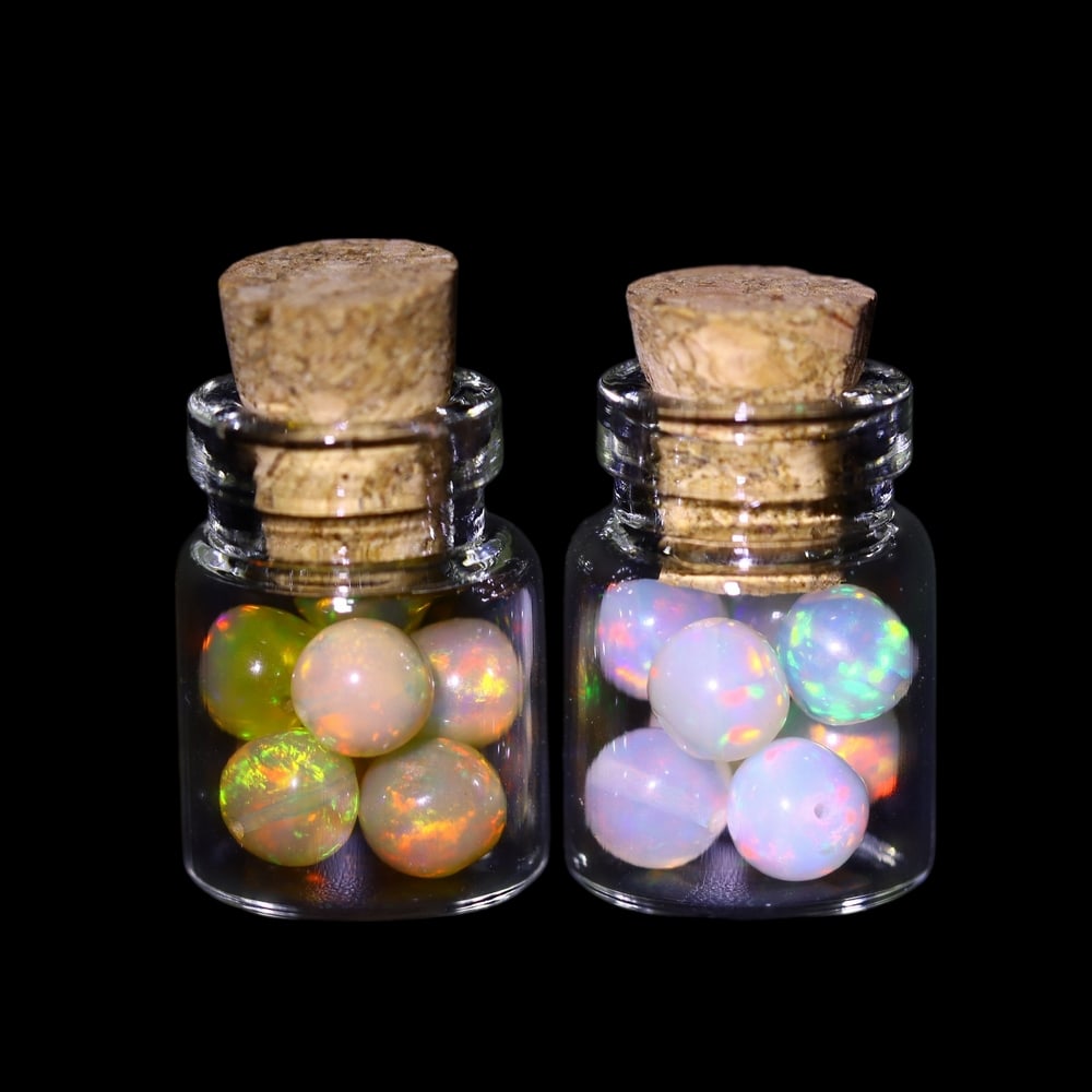 Twin Pack - 4.5mm Ethiopian Opal Ball in Display Jar - Bottle Size 1.5cm , 88C: Ksmith Heritage AuctioneersSubject: Natural Opal (with bottle) Origin: Ethiopia Treatment: Unheated