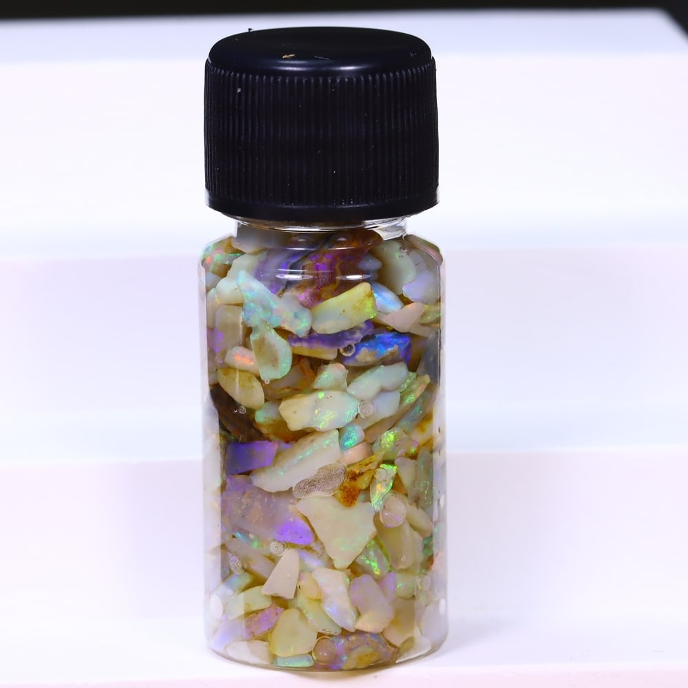 Australian Lightning Ridge Crystal Black Opal Rough Chip Jar (Good For Display), 979B: Ksmith Heritage Auctioneers Subject: Natural Australian Opal Origin: Australia Quantity: 1 Jar as photo