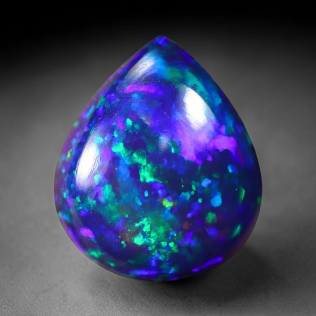 *1.79Ct Smoked Welo Opal Polished - Ethiopian Opal , 307C: Ksmith Heritage Auctioneers Subject: Natural Ethiopian Welo Opal Origin: Ethiopia Carat Weight: 1.79Ct Dimension: 10.7x9x3.8 mm Treatment: Smoked Type: Cabochon, Polished<